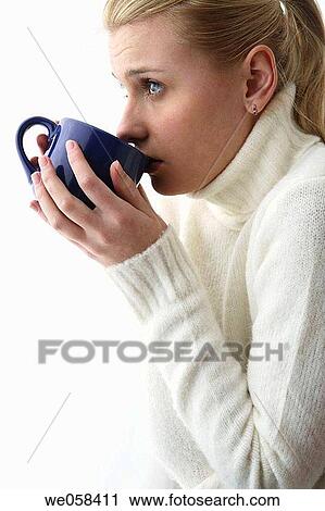 Stock Image - blond, cold, blue eyes, absorbed. Fotosearch