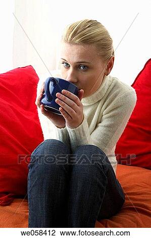 Stock Image - blond, cold, blue eyes, absorbed. Fotosearch