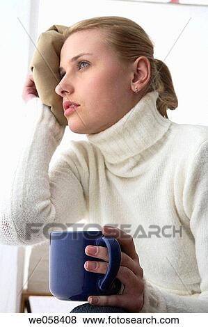 Stock Photo - blue eyes, contemporary, absorbed. Fotosearch