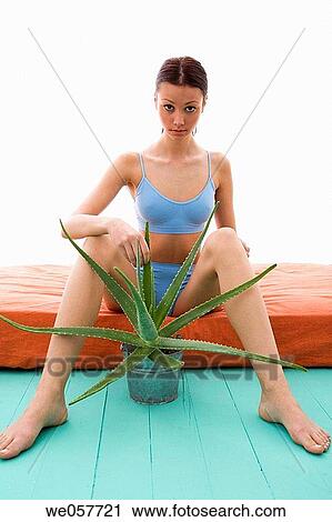 Body care, carnality, brunette, aloe vera View Large Photo Image Stock Image - Body care, carnality, brunette, aloe vera. Fotosearch