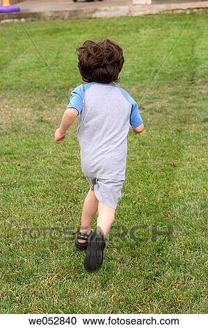 Boy running View Large Photo Image Stock Image - Boy running. Fotosearch