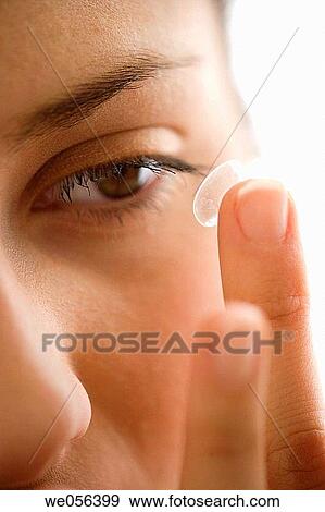 Stock Photo - Brown eye, brunette, Close-up. Fotosearch