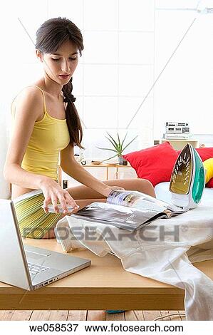 browse, brunette, browsing, at-home View Large Photo Image Stock Photo - browse, brunette, browsing, at-home. Fotosearch