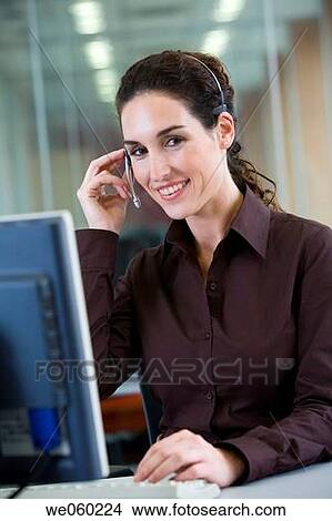 Picture - brunette, business, businesspeople, businesswoman. Fotosearch