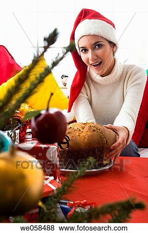 Stock Photo - brunette, celebration, celebrate, at-home. Fotosearch