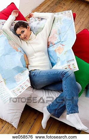 Stock Photograph - brunette, chilling out, at-home. Fotosearch