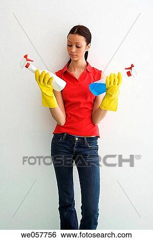Stock Photograph - brunette, clean, cleaning, Cleaning product. Fotosearch