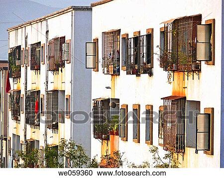 Stock Image - Buildings perspective of showing windows at row. Vadgaon Budruk. Pune, Maharashtra, India.. Fotosearch