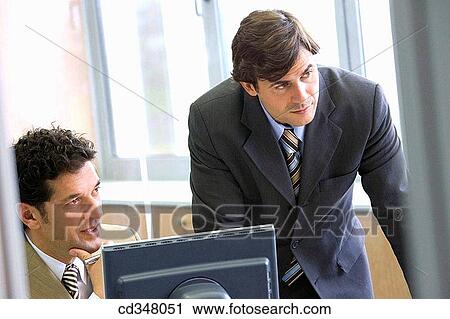 Stock Image - business, businessman, businesspeople, colleague. Fotosearch