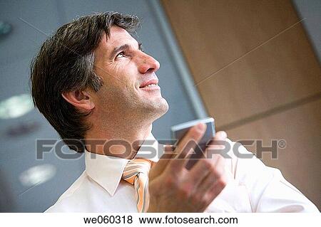 business, businessman, businesspeople, cell phone View Large Photo Image Stock Photo - business, businessman, businesspeople, cell phone. Fotosearch