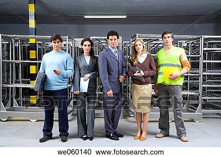Stock Image - businessman, businesswoman, businesspeople, Attache case. Fotosearch