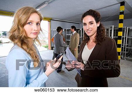 businesspeople, businesswoman, Attache case View Large Photo Image Stock Image - businesspeople, businesswoman, Attache case. Fotosearch