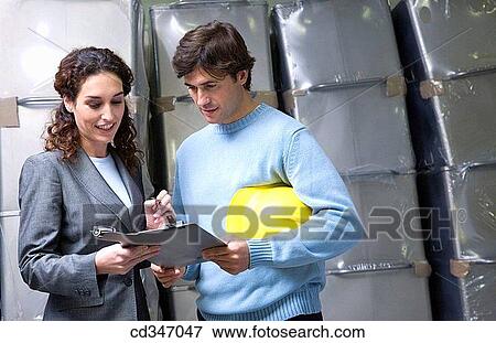 Stock Photo - businesspeople, businesswoman, Attache case. Fotosearch