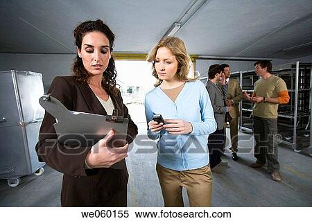 businesspeople, cell phone, businesswoman, Attache case View Large Photo Image Stock Photography - businesspeople, cell phone, businesswoman, Attache case. Fotosearch