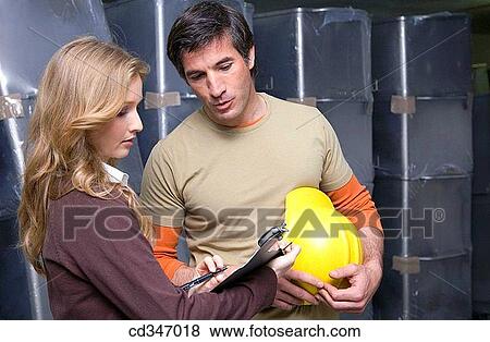businesspeople, check, businesswoman, Attache case View Large Photo Image Stock Photo - businesspeople, check, businesswoman, Attache case. Fotosearch