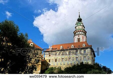 Castle tower of the 18th century Krumlovsky zamek chateau rising over buildings of the Latran neighborhood in the UNESCO World Heritage town of Cesky Krumlov_ Czech Republic View Large Photo Image Stock Photo - Castle tower of the 18th century Krumlovsky zamek chateau rising over buildings of the Latran neighborhood in the UNESCO World Heritage town of Cesky Krumlov_ Czech Republic. Fotosearch