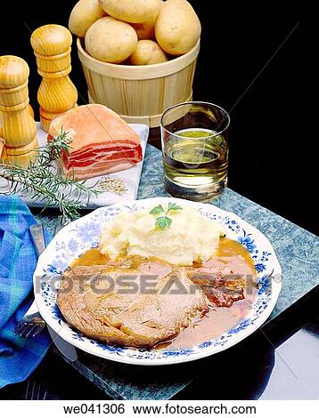 Chops in wine sauce View Large Photo Image Stock Photograph - Chops in wine sauce. Fotosearch