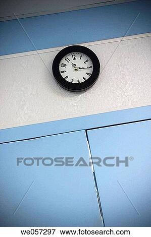 Clock on a factory wall View Large Photo Image Stock Photo - Clock on a factory wall. Fotosearch