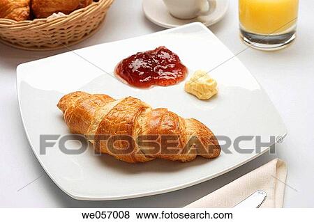 Croissant jelly and butter on a plate View Large Photo Image Stock Photo - Croissant jelly and butter on a plate. Fotosearch