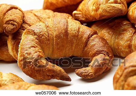 Croissants on a white background View Large Photo Image Stock Photograph - Croissants on a white background. Fotosearch