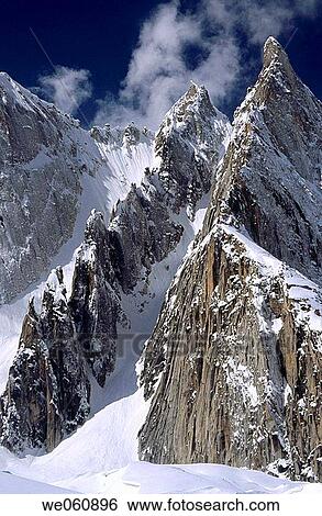 Iced-up rock ridge after storm above Baltoro glacier. Karakoram mountains, Pakistan View Large Photo Image Stock Photograph - Iced-up rock ridge after storm above Baltoro glacier. Karakoram mountains, Pakistan. Fotosearch