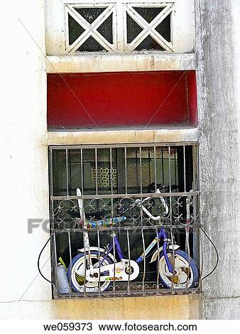 Kids Small bicycle in the flats window. Pune, Maharashtra, India. View Large Photo Image Stock Image - Kids Small bicycle in the flats window. Pune, Maharashtra, India.. Fotosearch