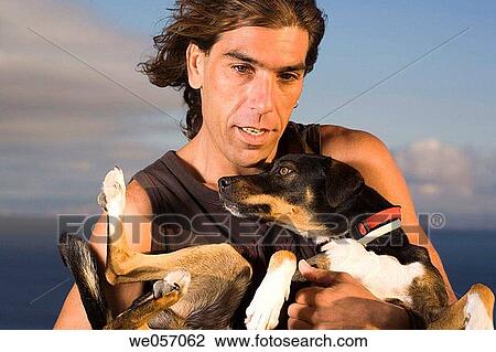 Man Holding His Dog View Large Photo Image Stock Image - Man Holding His Dog. Fotosearch