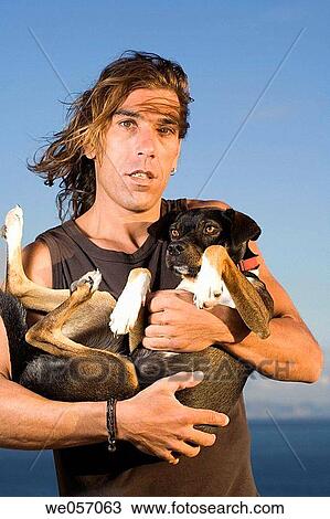 Man Holding His Dog View Large Photo Image Stock Image - Man Holding His Dog. Fotosearch