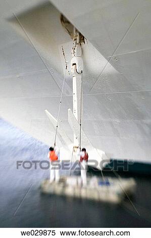 Men painting the anchor of a cruiseship View Large Photo Image Stock Photography - Men painting the anchor of a cruiseship. Fotosearch
