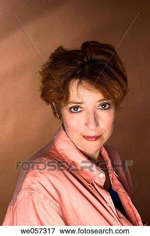 Middle_age woman posing View Large Photo Image Stock Photo - Middle_age woman posing. Fotosearch