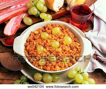 ? Migas? (traditional dish in Spanish cuisine) with grapes View Large Photo Image Picture - ? Migas? (traditional dish in Spanish cuisine) with grapes. Fotosearch