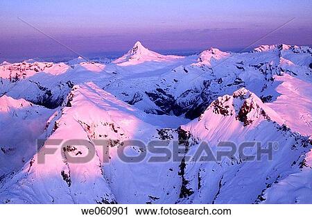 Mount Aspiring at sunset. Aerial view. Winter. Mount Aspiring National Park. New Zealand. View Large Photo Image Stock Image - Mount Aspiring at sunset. Aerial view. Winter. Mount Aspiring National Park. New Zealand.. Fotosearch