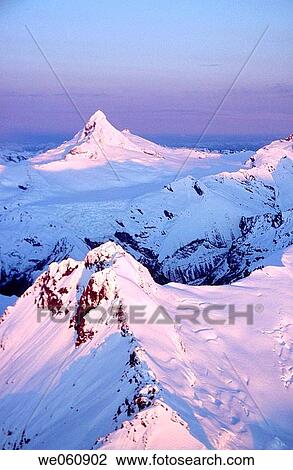 Mount Aspiring at sunset. Aerial view. Winter. Mount Aspiring National Park. New Zealand. View Large Photo Image Stock Image - Mount Aspiring at sunset. Aerial view. Winter. Mount Aspiring National Park. New Zealand.. Fotosearch