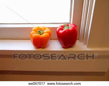 Orange and Red Peppers on Windowsill View Large Photo Image Stock Photo - Orange and Red Peppers on Windowsill. Fotosearch