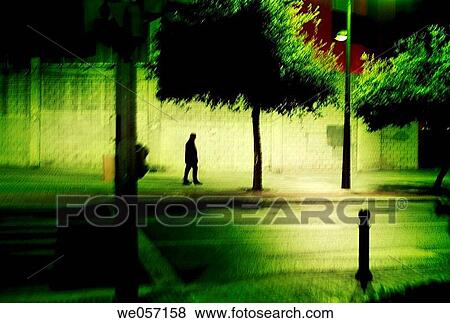 Passer-by in the night, Valencia View Large Photo Image Stock Photo - Passer-by in the night, Valencia. Fotosearch
