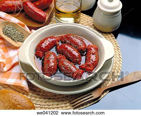 Pork sausage in white wine sauce View Large Photo Image Stock Image - Pork sausage in white wine sauce. Fotosearch