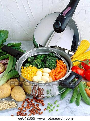 Pressure cooker with vegetables View Large Photo Image Stock Photography - Pressure cooker with vegetables. Fotosearch