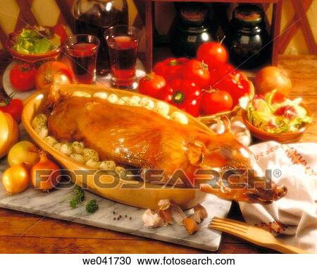 Roast suckling pig View Large Photo Image Stock Image - Roast suckling pig. Fotosearch