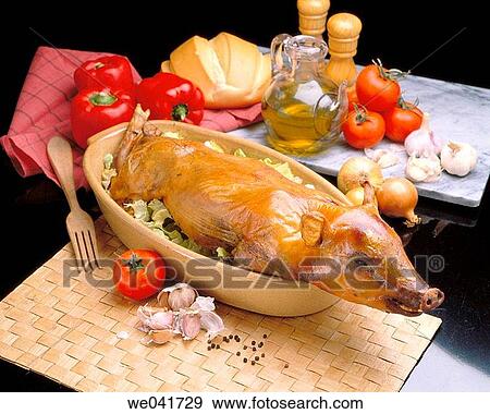 Roast suckling pig View Large Photo Image Stock Photo - Roast suckling pig. Fotosearch
