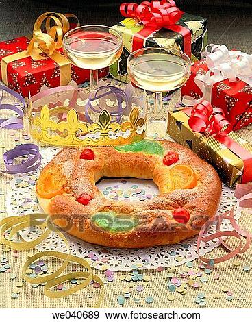 ? Rosc? n de Reyes? Spanish typically O-shaped pastry stuffed with marzipan; it's traditionally eaten on January 6 (Epiphany) View Large Photo Image Stock Photo - ? Rosc? n de Reyes? Spanish typically O-shaped pastry stuffed with marzipan; it's traditionally eaten on January 6 (Epiphany). Fotosearch