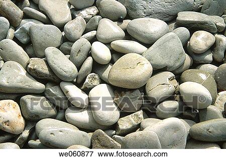 Rounded limestone pebbles. Kaikoura beach. South island. New Zealand. View Large Photo Image Stock Photo - Rounded limestone pebbles. Kaikoura beach. South island. New Zealand.. Fotosearch