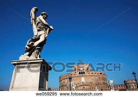 Stock Photography - Sant? Angelo castle and bridge over Tiber river with one of the Bernini's angels at fore, Rome. Lazio, Italy. Fotosearch
