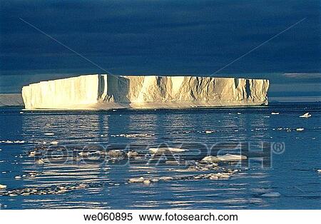 Tabular iceberg at sunset, Antarctic Sound, Weddell Sea. Antarctica View Large Photo Image Stock Photography - Tabular iceberg at sunset, Antarctic Sound, Weddell Sea. Antarctica. Fotosearch