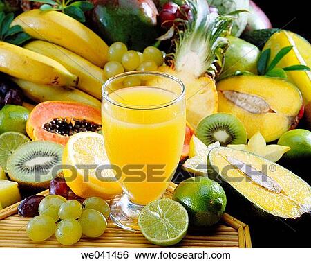 Tropical fruits juice View Large Photo Image Stock Photograph - Tropical fruits juice. Fotosearch