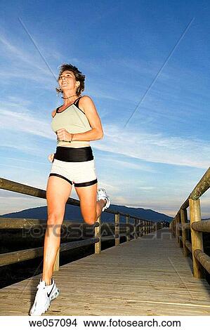 Woman Jogging View Large Photo Image Picture - Woman Jogging. Fotosearch