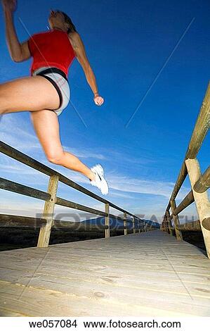 Picture - Woman Running. Fotosearch