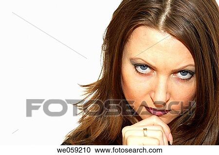 Woman With Hand On Chin Looking Into Camera Looking Mean View Large Photo Image Stock Image - Woman With Hand On Chin Looking Into Camera Looking Mean. Fotosearch