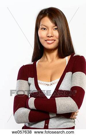 Young asian woman in studio. View Large Photo Image Stock Photo - Young asian woman in studio.. Fotosearch