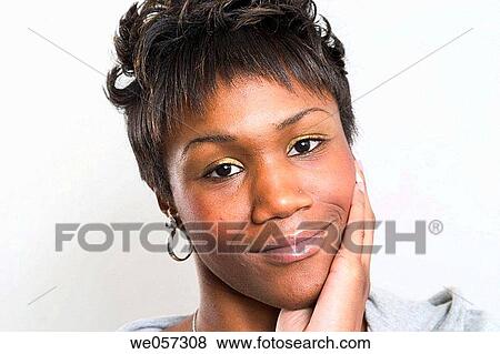 Stock Photo - Young black woman posing. Fotosearch