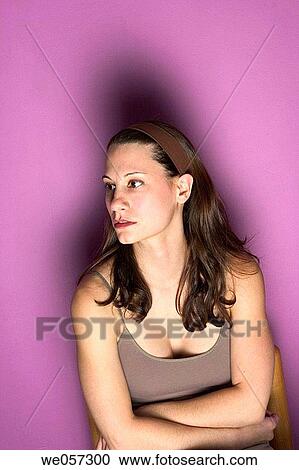 Stock Image - Young woman posing. Fotosearch